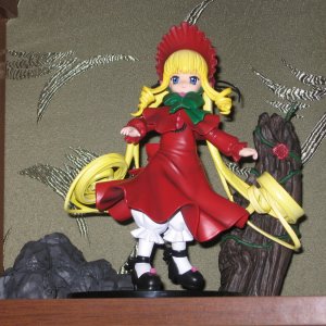 Shinku (аниме Rozen Maiden)
Выиграна на аукционе у Nodanoshi
Там еще розочка светиться, если включить ее конечно!