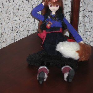кукла Horo (аниме Spice and Wolf) 
Фотки ИМХО не очень получились. Если подробности интересуют - обзор смотрите:
http://blog.livedoor.jp/azure_toy_box